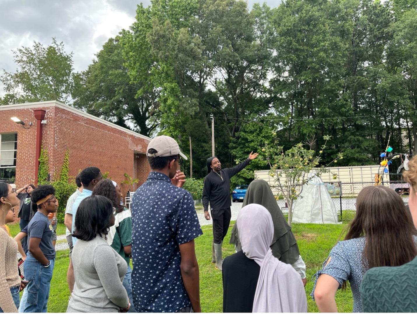Students participating in a tour at a facility. 